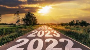 New Year 2022 Goals Concept : Empty asphalt road sunrise with text go to New year 2022